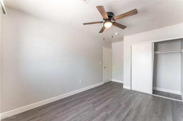 2111 Hollow Oak Ave, North Las Vegas, NV 89031 - unfurnished bedroom with wood finished floors, a closet, and ceiling fan