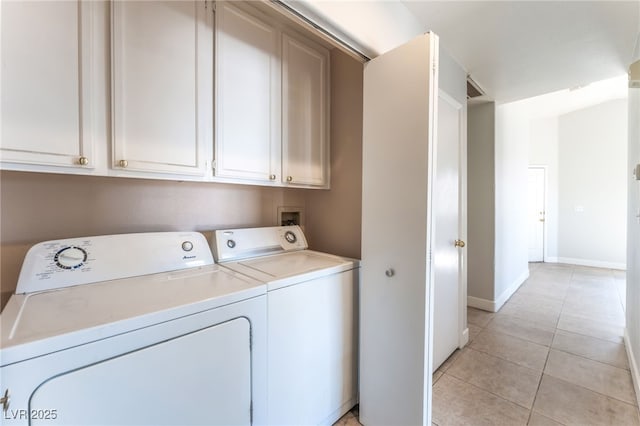2111 Hollow Oak Ave, North Las Vegas, NV 89031 - laundry room featuring washer and clothes dryer and light tile patterned floors