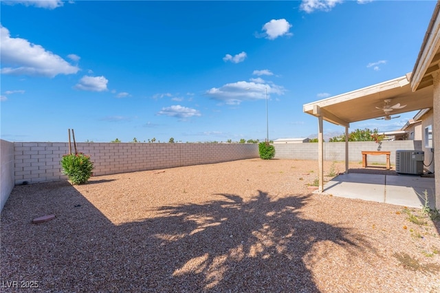 2111 Hollow Oak Ave, North Las Vegas, NV 89031 - fenced backyard with a patio