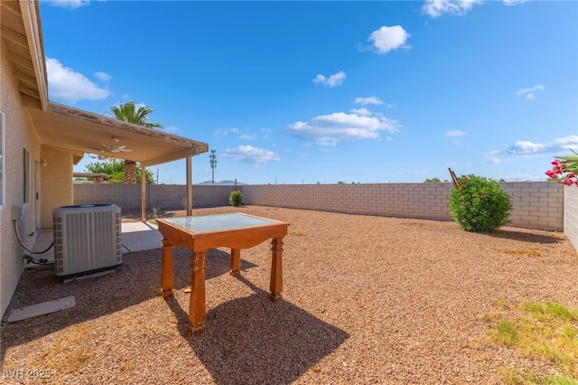 2111 Hollow Oak Ave, North Las Vegas, NV 89031 - fenced backyard with a patio area