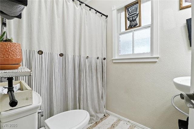 517 5th St, Boulder City, NV 89005 - bathroom featuring toilet and a shower with shower curtain