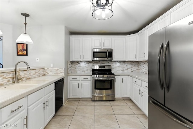 620 Painted Cloud Pl, Las Vegas, NV 89144 - kitchen with appliances with stainless steel finishes, backsplash, light countertops, and light tile patterned floors
