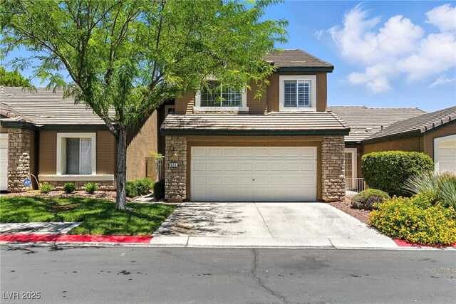 620 Painted Cloud Pl, Las Vegas, NV 89144 - view of front of property with stone siding, concrete driveway, and a tile roof