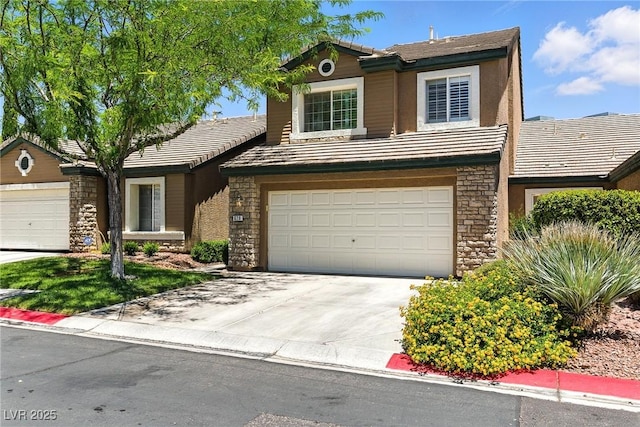 620 Painted Cloud Pl, Las Vegas, NV 89144 - traditional home with stone siding, concrete driveway, and a garage