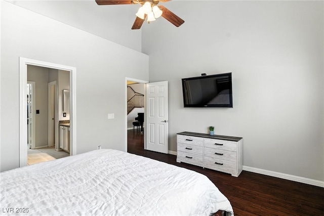 620 Painted Cloud Pl, Las Vegas, NV 89144 - bedroom featuring a towering ceiling, wood finished floors, ceiling fan, and connected bathroom
