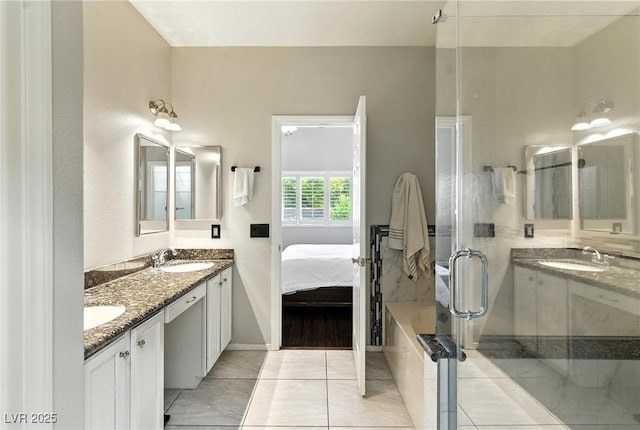 620 Painted Cloud Pl, Las Vegas, NV 89144 - bathroom featuring double vanity, ensuite bath, a shower stall, and tile patterned flooring
