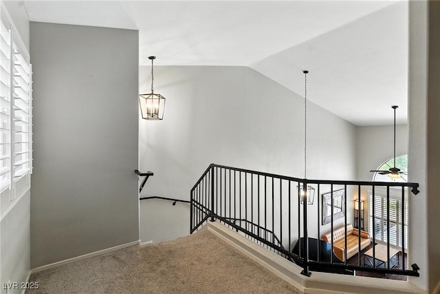 620 Painted Cloud Pl, Las Vegas, NV 89144 - stairs featuring vaulted ceiling, a ceiling fan, carpet, and a chandelier