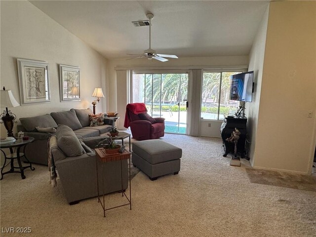 9505 Quail Ridge Dr, Las Vegas, NV 89134 - carpeted living room featuring ceiling fan and vaulted ceiling