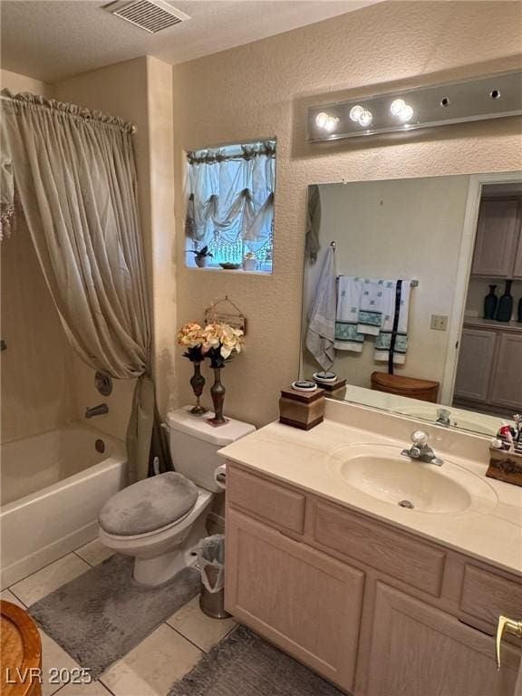 9505 Quail Ridge Dr, Las Vegas, NV 89134 - bathroom featuring tile patterned flooring, shower / tub combo, vanity, and a textured wall