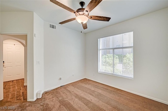 2050 W Warm Springs Rd Unit 4512, Henderson, NV 89014 - unfurnished room with carpet flooring, a ceiling fan, and arched walkways