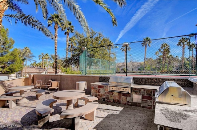 2050 W Warm Springs Rd Unit 4512, Henderson, NV 89014 - view of patio / terrace featuring area for grilling