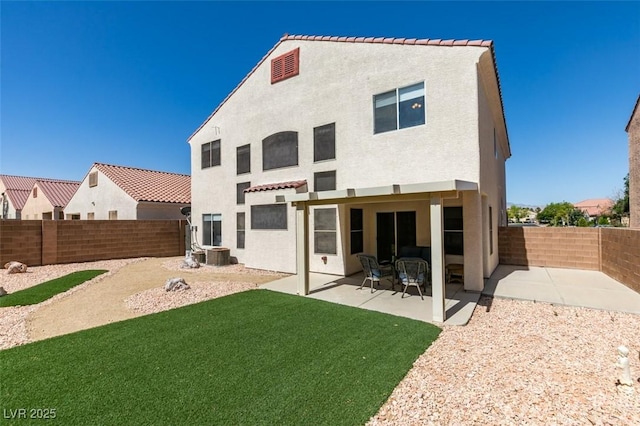 10952 Porto Foxi St, Las Vegas, NV 89141 - back of house with stucco siding, a fenced backyard, and a patio