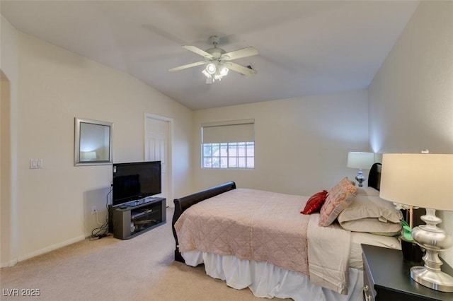 10952 Porto Foxi St, Las Vegas, NV 89141 - bedroom with light colored carpet, vaulted ceiling, and ceiling fan