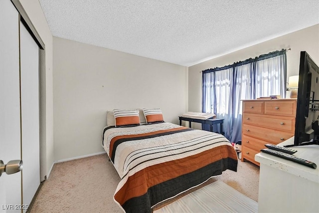 7113 Carrondale Way, Las Vegas, NV 89128 - carpeted bedroom featuring a textured ceiling and a closet