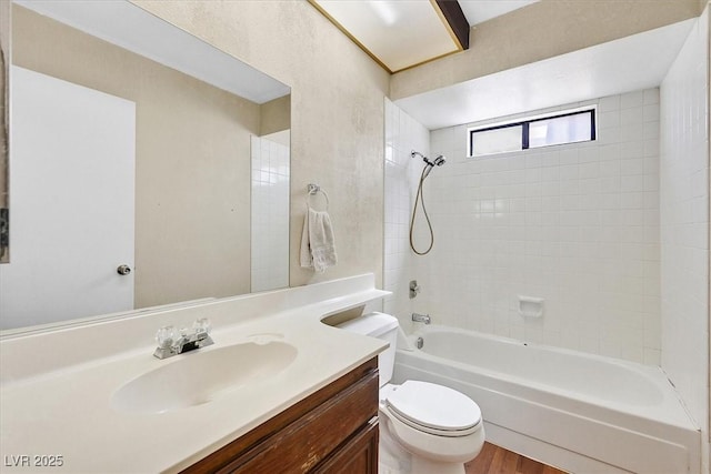 7113 Carrondale Way, Las Vegas, NV 89128 - full bath with vanity, shower / bath combination, and wood finished floors