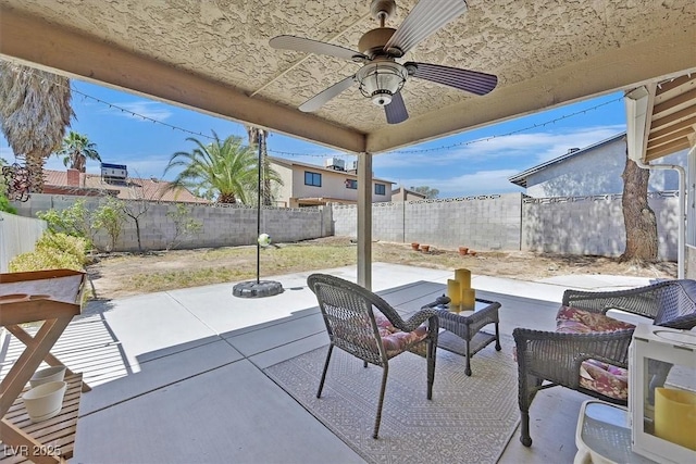 7113 Carrondale Way, Las Vegas, NV 89128 - fenced backyard featuring a patio area and ceiling fan