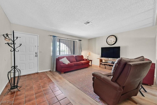7113 Carrondale Way, Las Vegas, NV 89128 - living area featuring a textured ceiling and baseboards