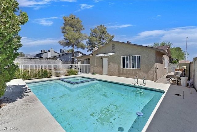 7113 Carrondale Way, Las Vegas, NV 89128 - view of swimming pool featuring a fenced backyard, a patio, and a pool with connected hot tub