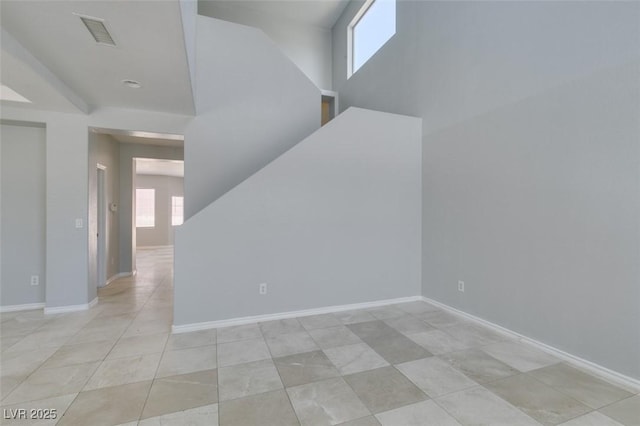 3941 Copper Stone Ct, North Las Vegas, NV 89032 - unfurnished room featuring plenty of natural light and light tile patterned floors