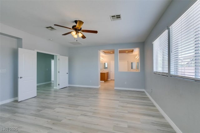 3941 Copper Stone Ct, North Las Vegas, NV 89032 - unfurnished bedroom with light wood-style flooring, ensuite bath, and ceiling fan