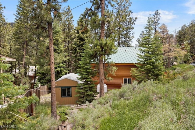 401 Alpine Way, Mount Charleston, NV 89124 - view of side of property featuring an outdoor structure and a metal roof