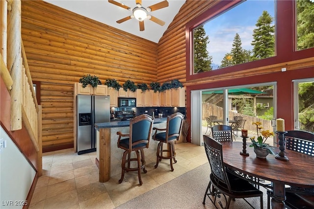 401 Alpine Way, Mount Charleston, NV 89124 - dining space featuring high vaulted ceiling, a ceiling fan, and log walls