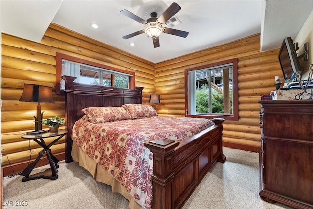 401 Alpine Way, Mount Charleston, NV 89124 - bedroom with multiple windows, light carpet, recessed lighting, log walls, and a ceiling fan