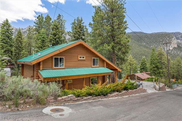401 Alpine Way, Mount Charleston, NV 89124 - log home featuring log exterior, a mountain view, and a metal roof