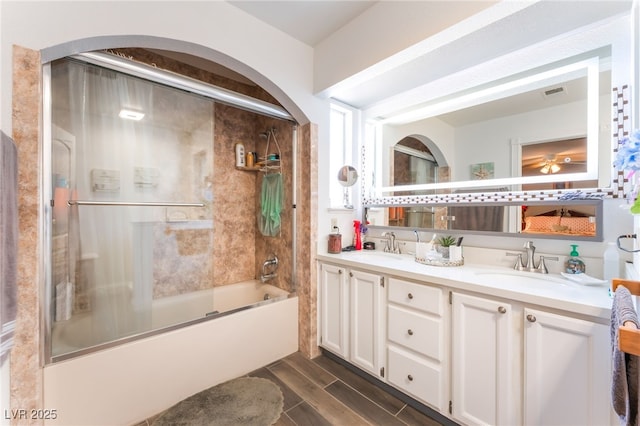 1723 Candice St, Las Vegas, NV 89156 - full bath with bath / shower combo with glass door, double vanity, and wood finished floors