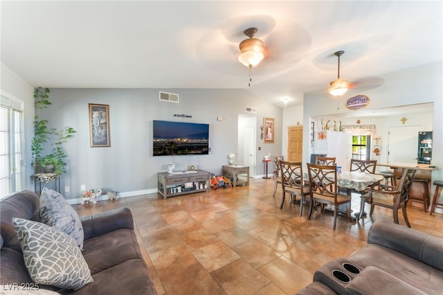 1723 Candice St, Las Vegas, NV 89156 - living room with ceiling fan, healthy amount of natural light, and lofted ceiling