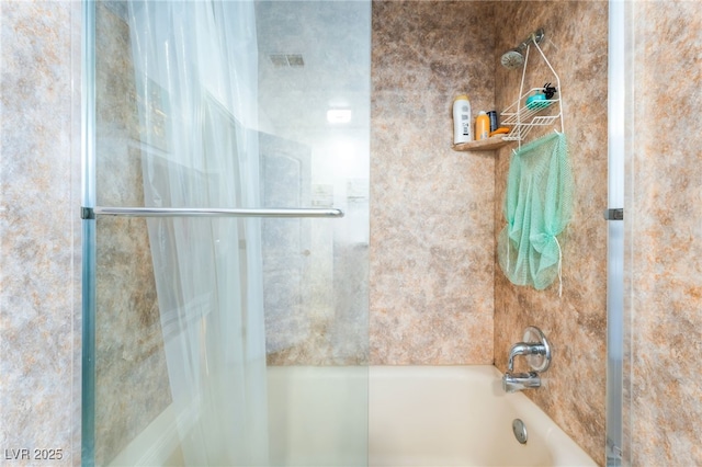 1723 Candice St, Las Vegas, NV 89156 - bathroom featuring combined bath / shower with glass door