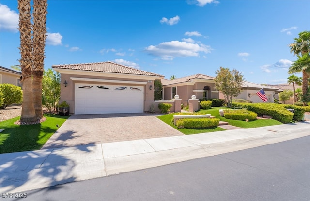 10331 Rio De Thule Ln, Las Vegas, NV 89135 - mediterranean / spanish home with stucco siding, driveway, a garage, and a tiled roof