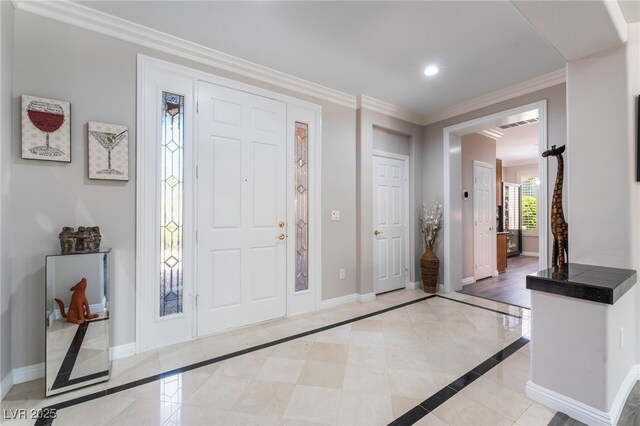 10331 Rio De Thule Ln, Las Vegas, NV 89135 - entrance foyer with inlaid floor details, ornamental molding, and recessed lighting