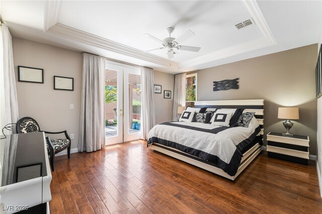 10331 Rio De Thule Ln, Las Vegas, NV 89135 - bedroom with a raised ceiling, access to outside, french doors, hardwood / wood-style floors, and a ceiling fan