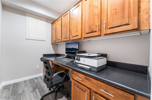 10331 Rio De Thule Ln, Las Vegas, NV 89135 - office area with wood finished floors and built in desk