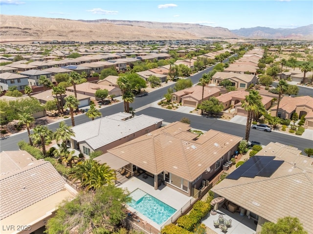 10331 Rio De Thule Ln, Las Vegas, NV 89135 - aerial view of residential area with a mountain backdrop and a pool