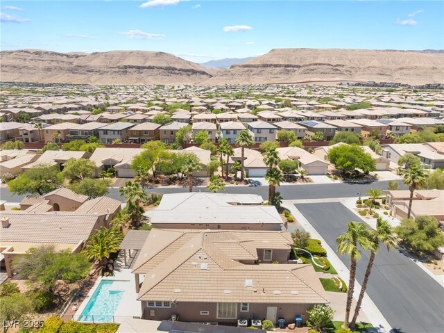 10331 Rio De Thule Ln, Las Vegas, NV 89135 - aerial perspective of suburban area with mountains