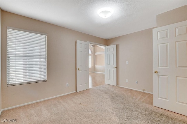 1981 Spring Lake Dr, Henderson, NV 89002 - unfurnished bedroom featuring carpet and multiple windows