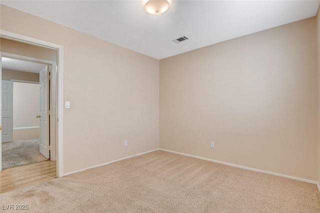 1981 Spring Lake Dr, Henderson, NV 89002 - spare room with light colored carpet and baseboards