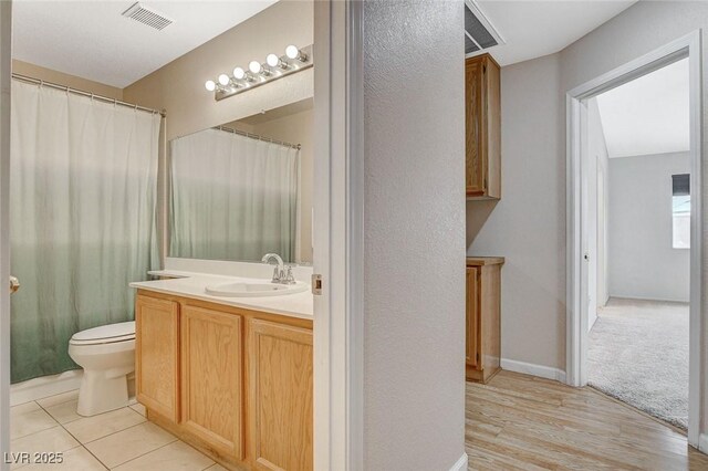 1981 Spring Lake Dr, Henderson, NV 89002 - bathroom featuring vanity and wood finished floors