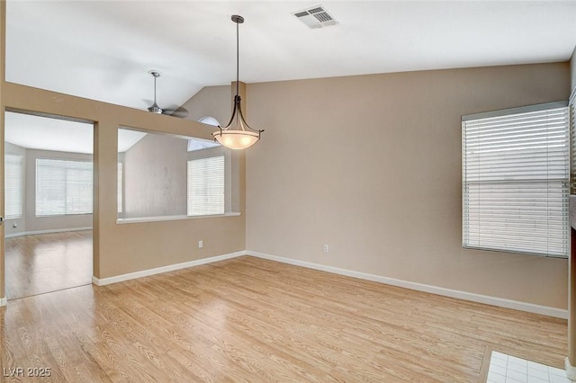 1981 Spring Lake Dr, Henderson, NV 89002 - unfurnished room with light wood-style flooring, ceiling fan, and lofted ceiling