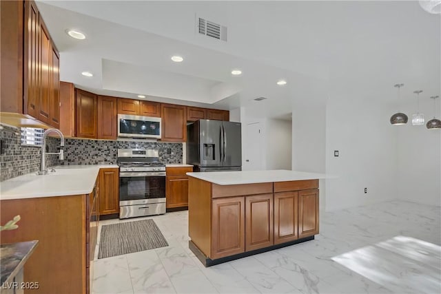 117 Lotus Blossom Ct, Las Vegas, NV 89145 - kitchen featuring appliances with stainless steel finishes, light marble finish flooring, recessed lighting, brown cabinets, and tasteful backsplash