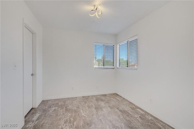 117 Lotus Blossom Ct, Las Vegas, NV 89145 - unfurnished bedroom with marble finish floors and baseboards