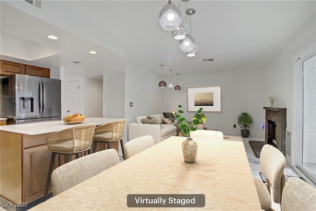 117 Lotus Blossom Ct, Las Vegas, NV 89145 - dining space featuring recessed lighting and a fireplace