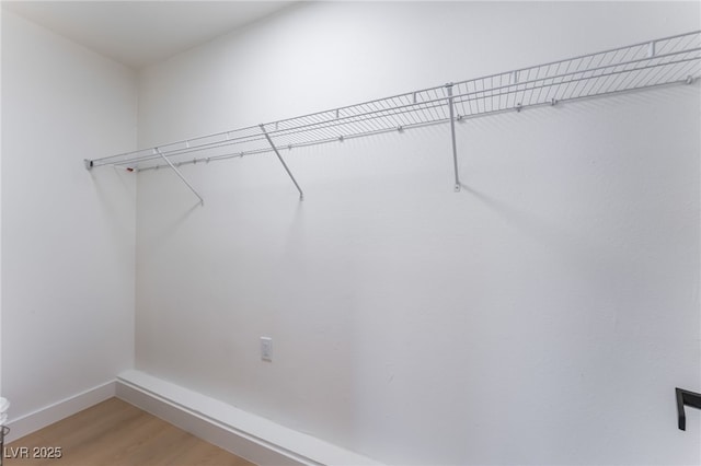 313 Agora Way, Las Vegas, NV 89110 - walk in closet featuring light wood-type flooring