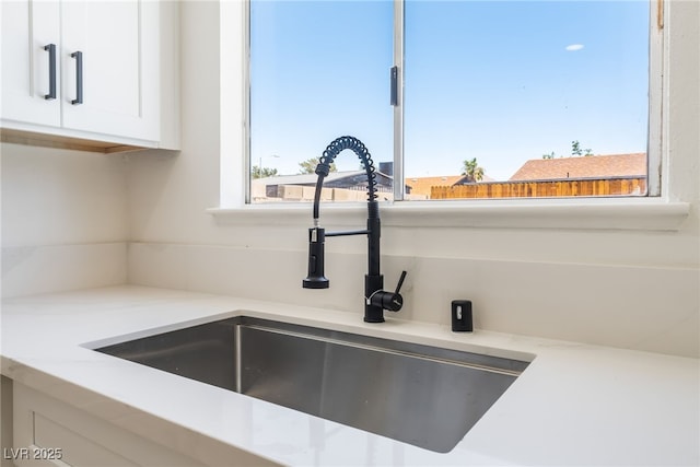 313 Agora Way, Las Vegas, NV 89110 - kitchen view of white cabinetry and light countertops