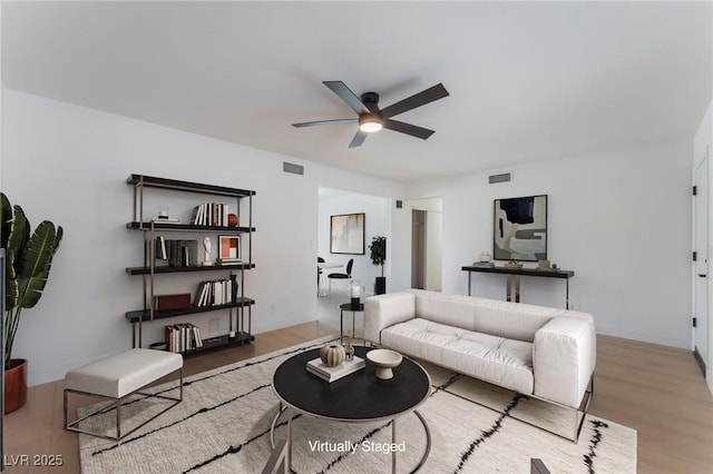313 Agora Way, Las Vegas, NV 89110 - living room with a ceiling fan and wood finished floors