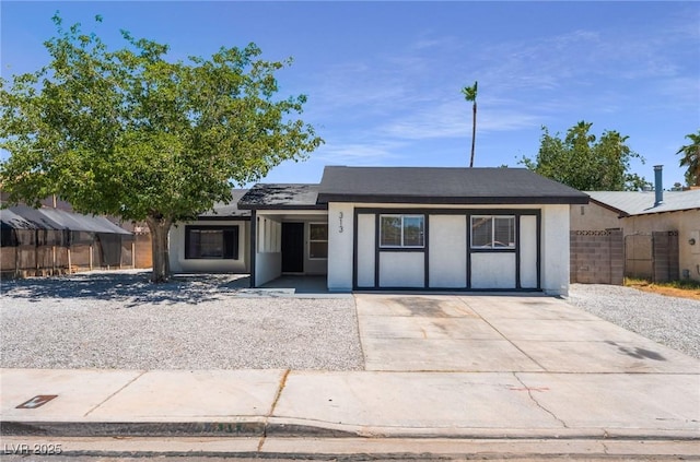 313 Agora Way, Las Vegas, NV 89110 - ranch-style house with stucco siding and driveway