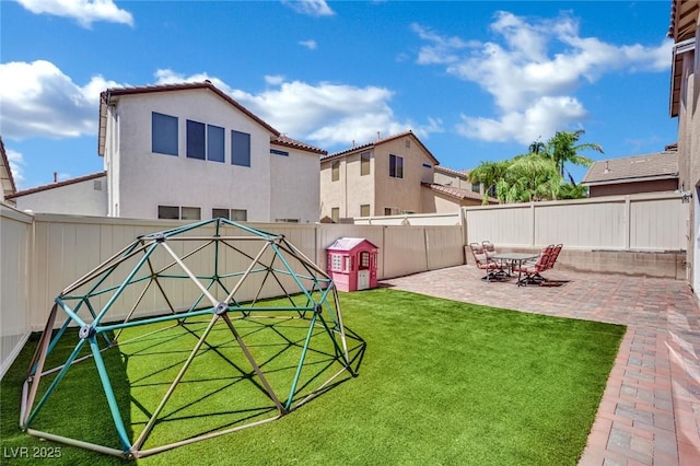 9131 Grand Sunburst Ct, Las Vegas, NV 89149 - fenced backyard featuring a patio area