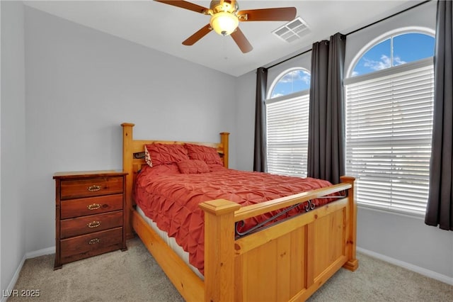 9131 Grand Sunburst Ct, Las Vegas, NV 89149 - bedroom with light carpet and a ceiling fan
